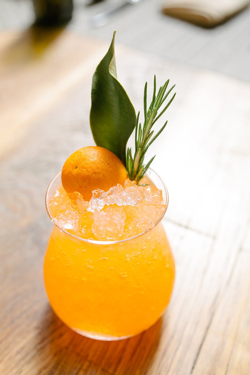 "Sunrise in Antarctica “ garnished with local kumquat w/ leaf and rosemary from our porch.